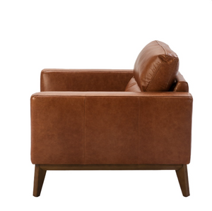 Fauteuil en cuir marron et pied en bois Angel Cerda