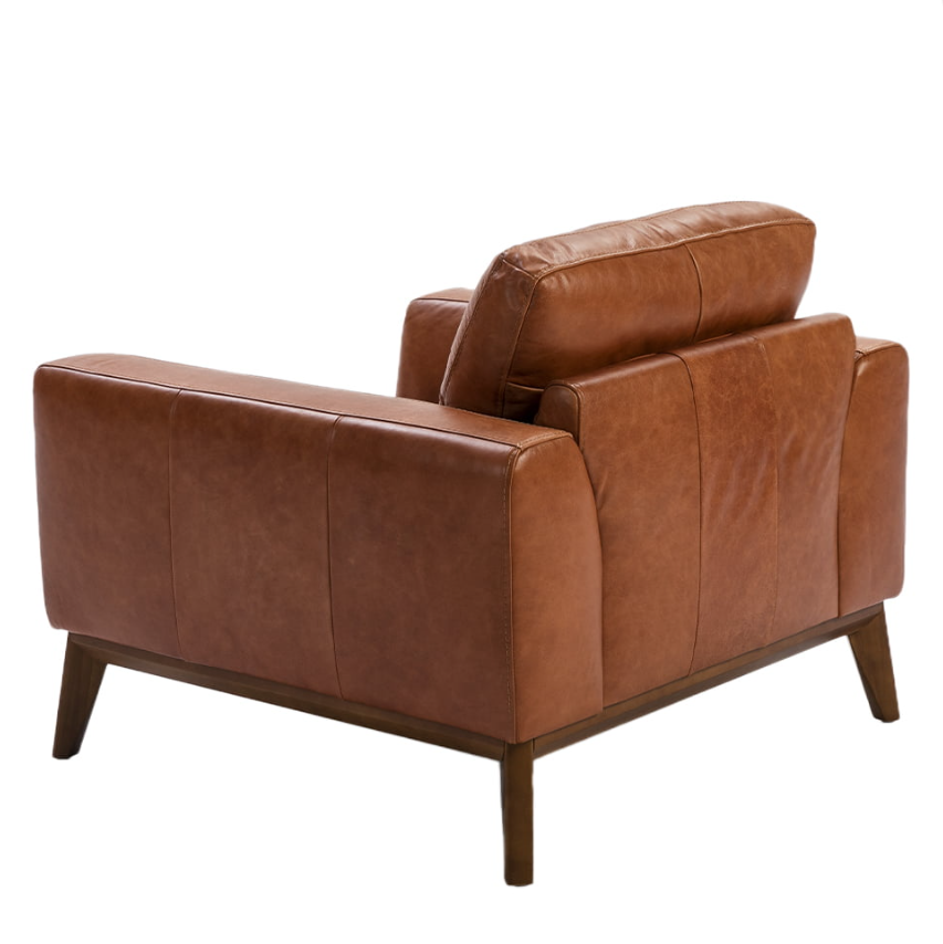 Fauteuil en cuir marron et pied en bois Angel Cerda
