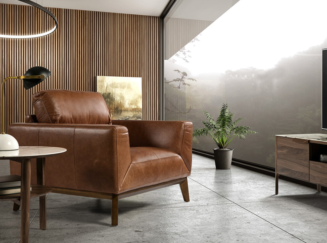 Fauteuil en cuir marron et pied en bois Angel Cerda